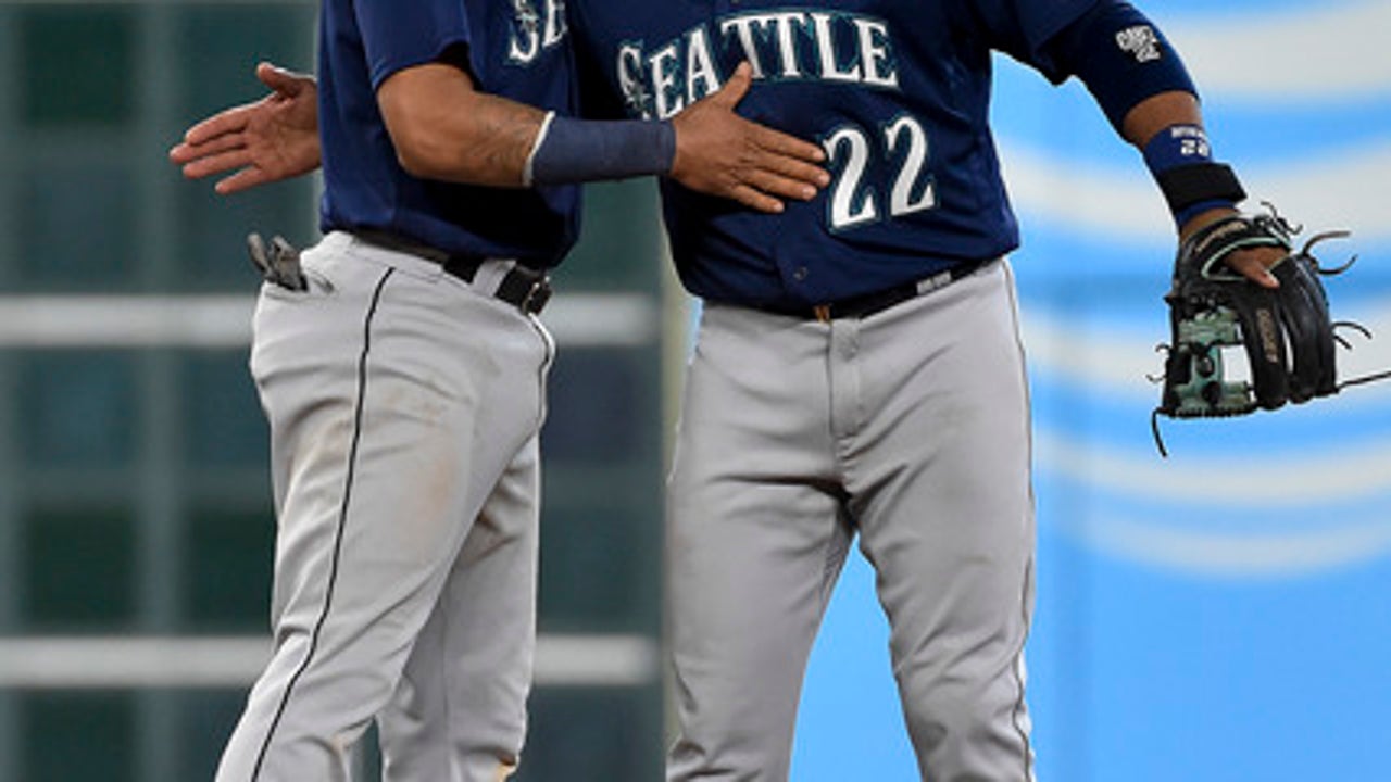 Cano's homers Mariners top Astros 12-4 to press playoff bid